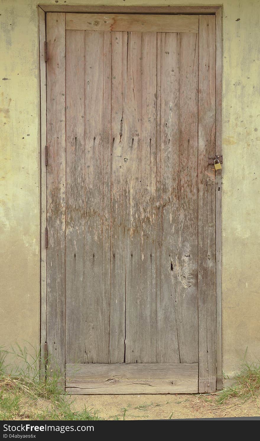 Old wooden door in Thailand country. Old wooden door in Thailand country.