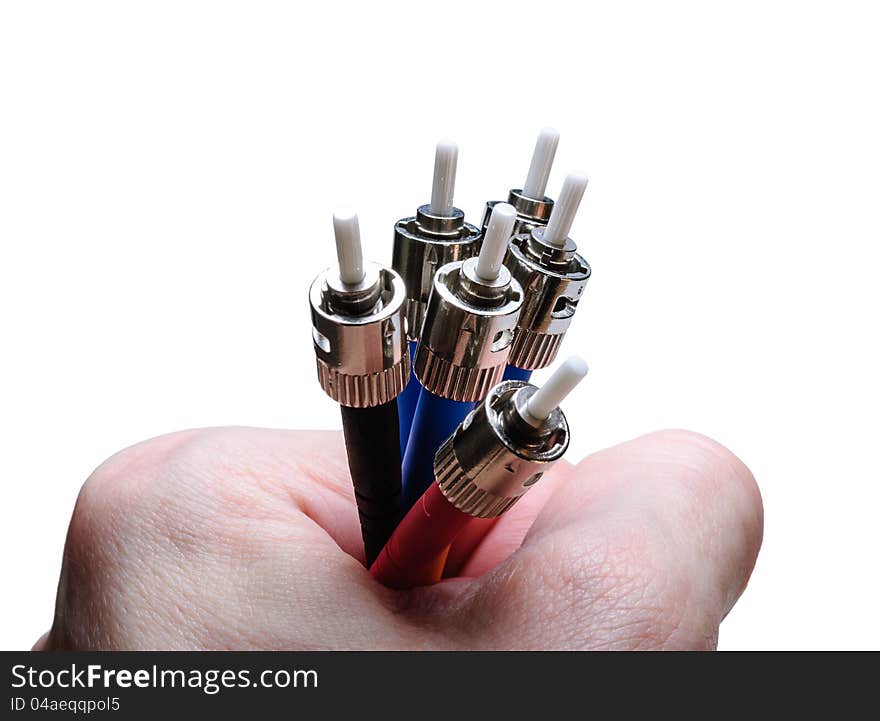 Several optical connectors ST-type in hand. Isolated on a white background. Several optical connectors ST-type in hand. Isolated on a white background.