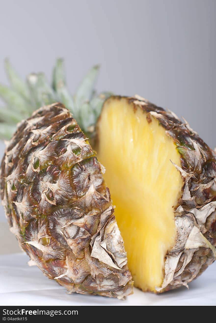 Juicy ripe pineapple cut in half