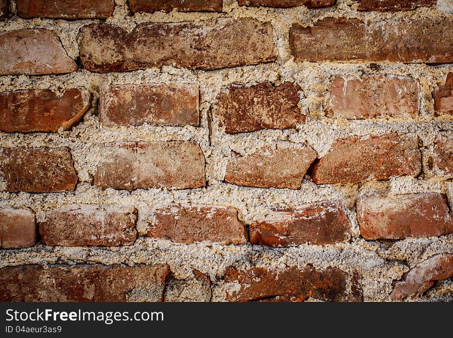 Toned red brick wall grunge background or texture