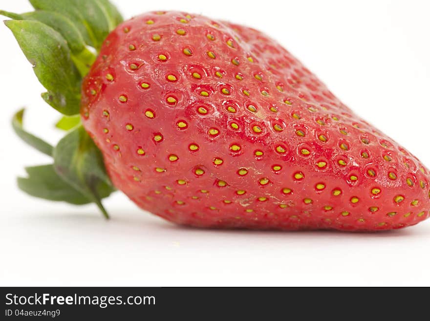 Close up of a strawberry with white background