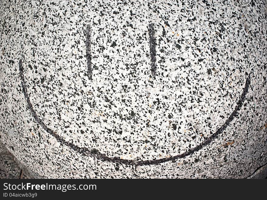 Coal drawing on a stone sphere. Coal drawing on a stone sphere