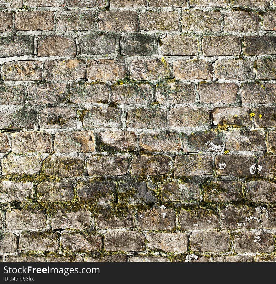 Fragment of an old brick wall