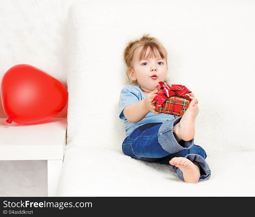 Beautiful Girl Holding A Gift