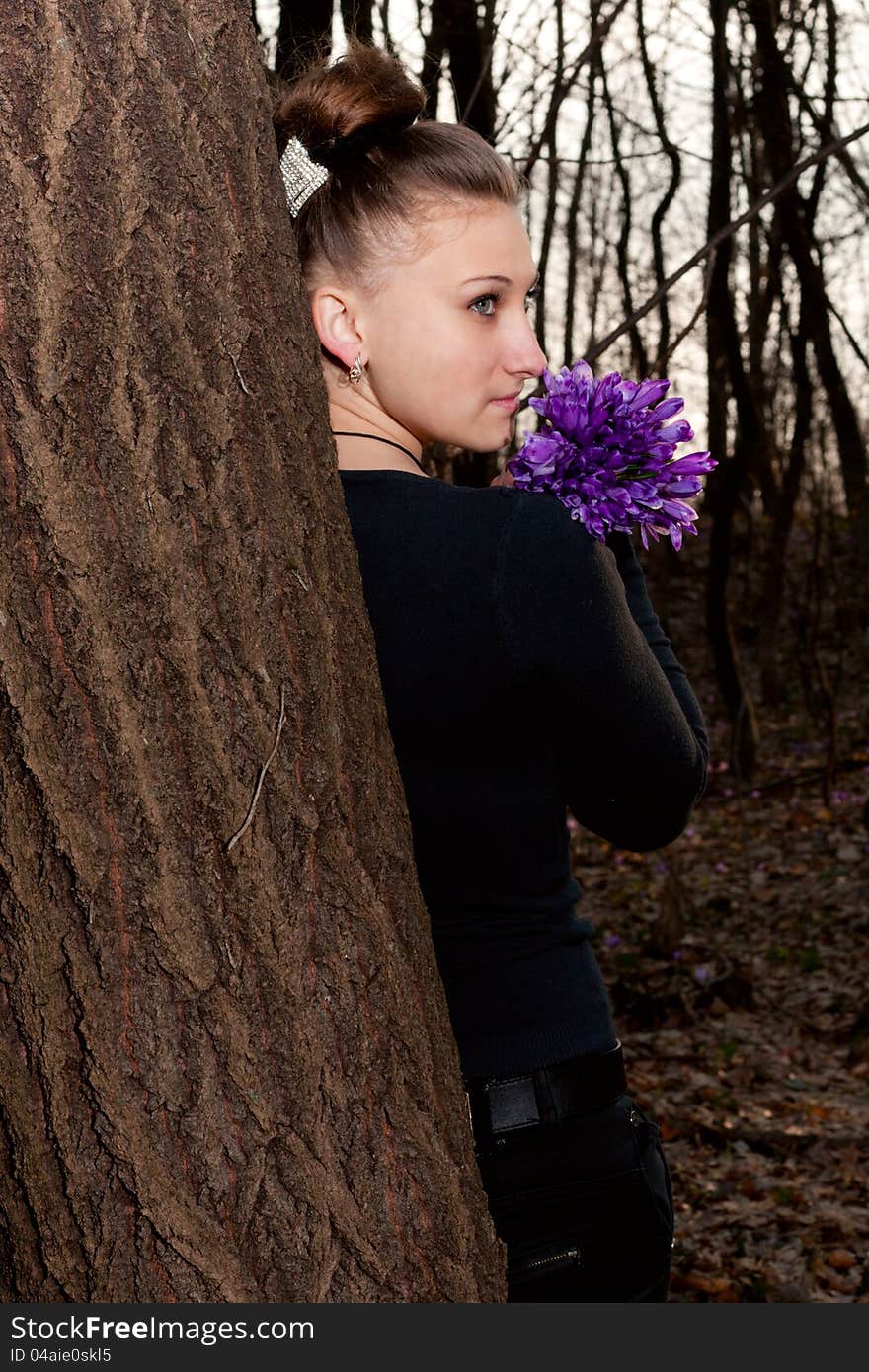 Girl with snowdrops