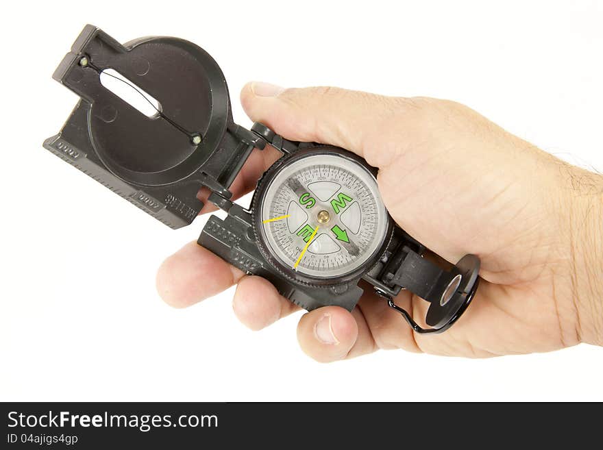 Boy with a compass in hand with white background