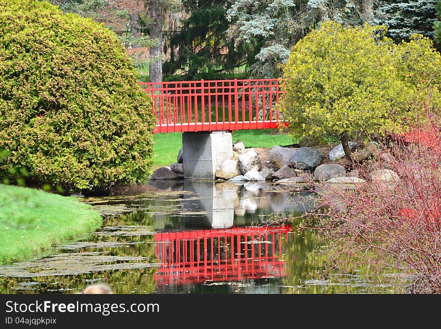 Beautiful red bridge on a nature trail