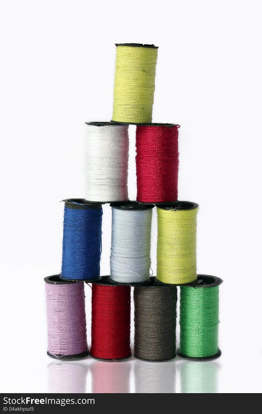 Ten Colored Spools Of Thread