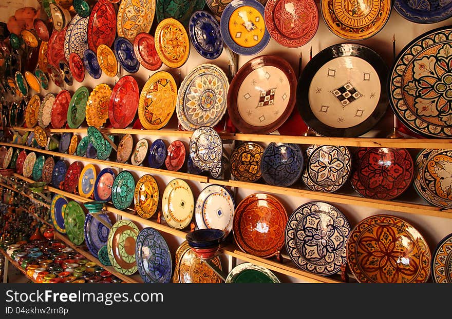 Beautiful arabic colorful pottery bowls made in the market in Morocco. Beautiful arabic colorful pottery bowls made in the market in Morocco