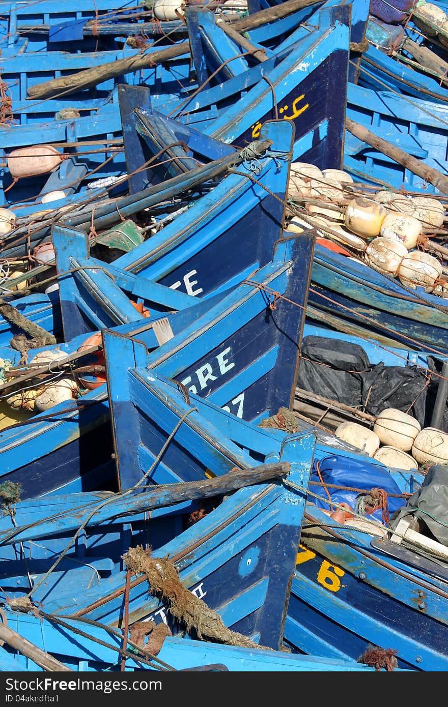 Old blue rusty boats In the Essaouira port, Morocco. Old blue rusty boats In the Essaouira port, Morocco