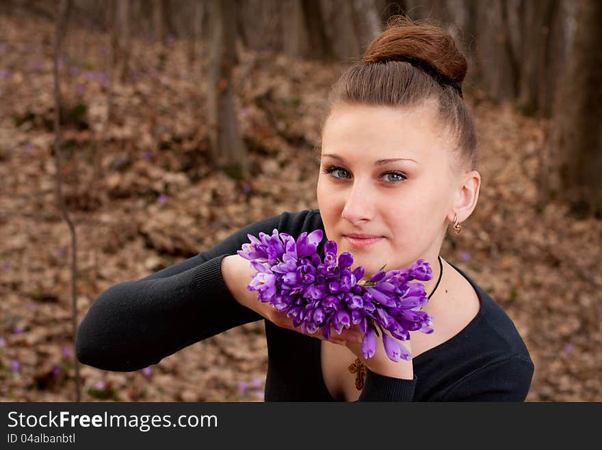 Girl with snowdrops