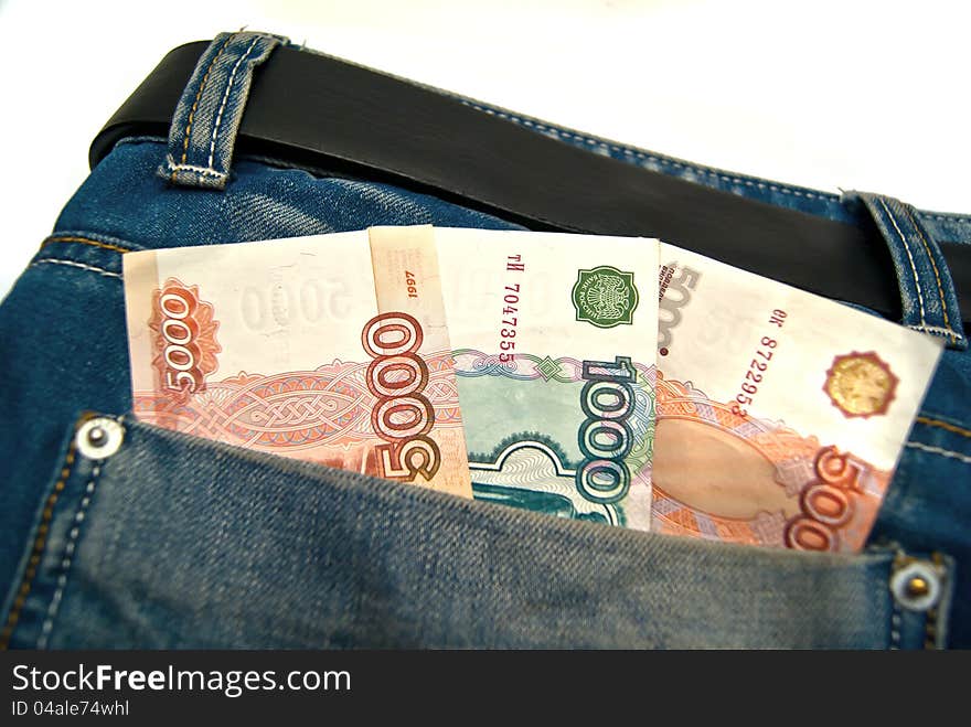 Banknotes in a blue jeans pocket