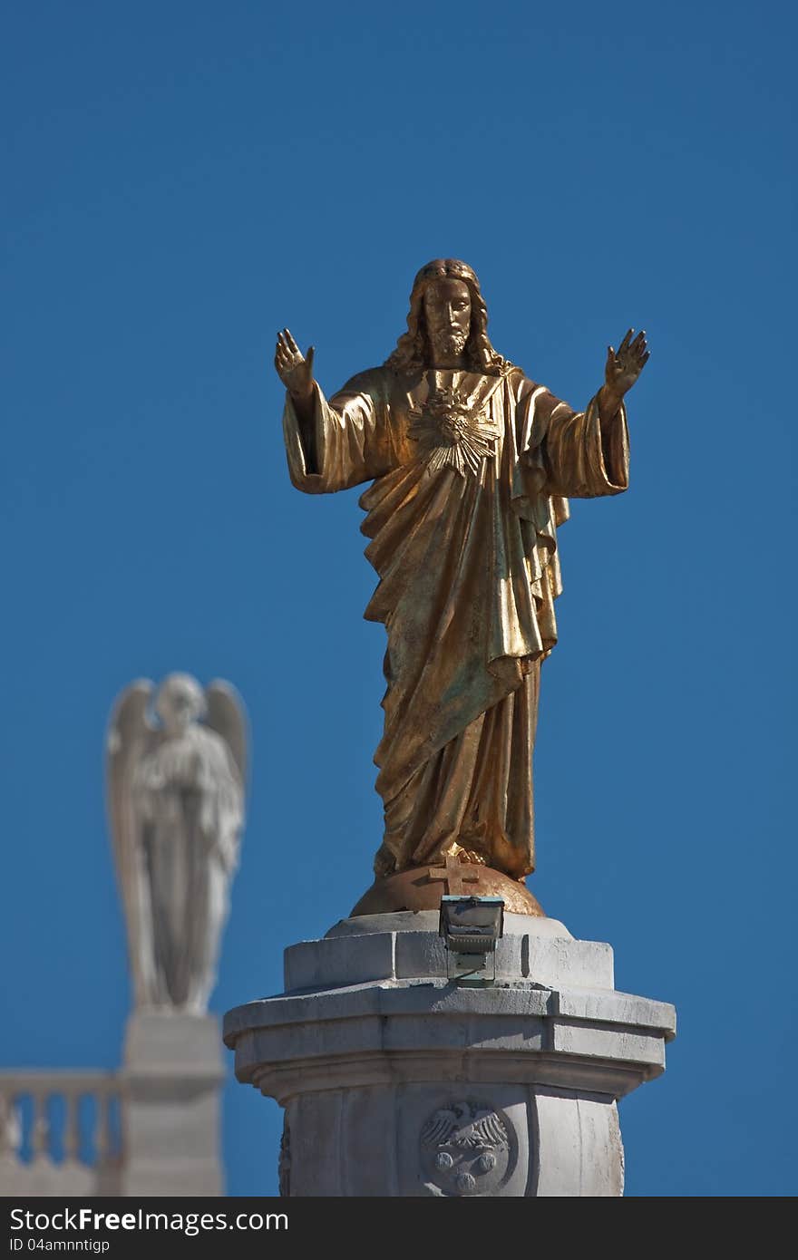 Golden Jesus Statue at the famous pilgrimage site of Fatima in Portugal