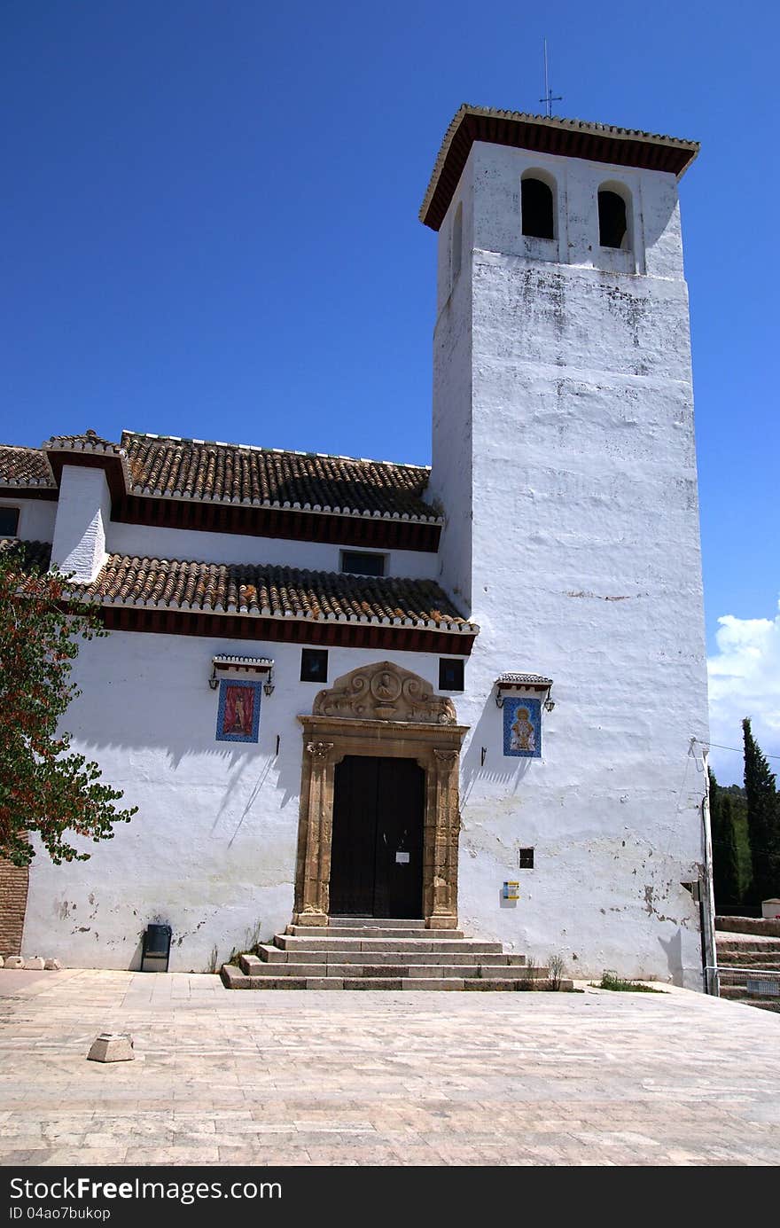 Old white church in Granada, Spain