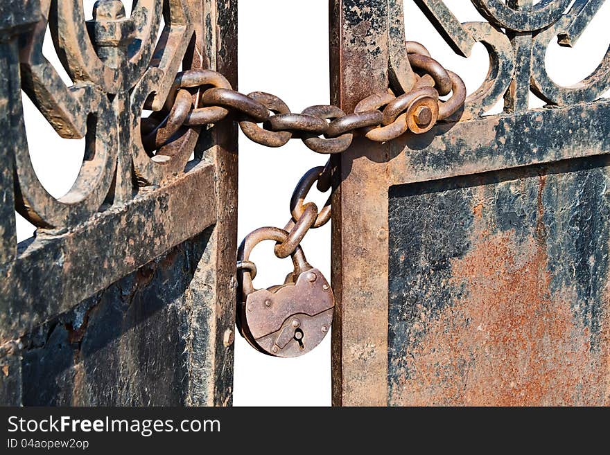 The old rusty lock on gate