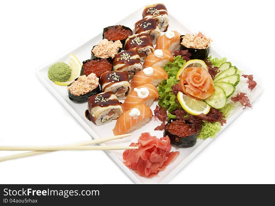 Large plate of sushi caviar salmon and eel on a white background