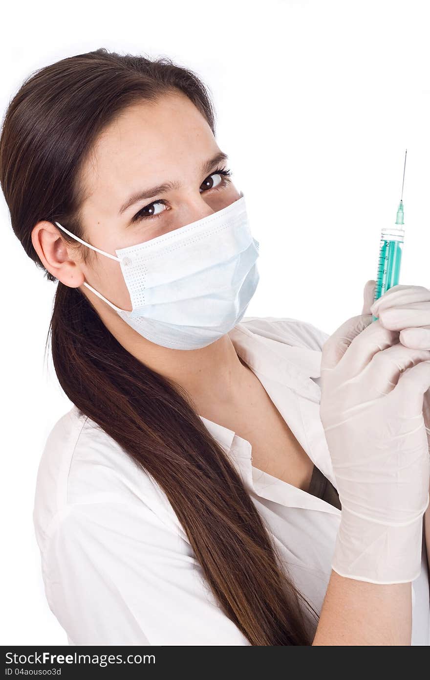 Nurse using a syringe