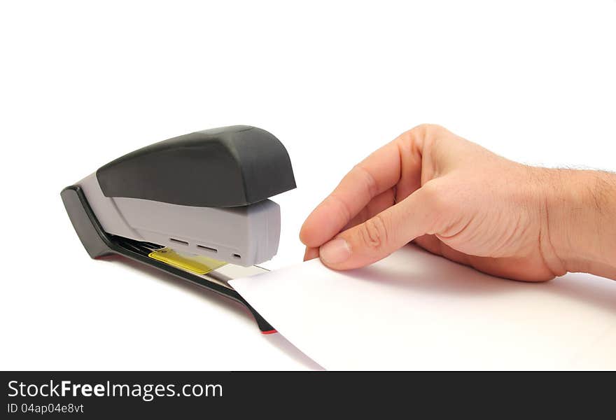 Hand sheets and stapler over white. Hand sheets and stapler over white