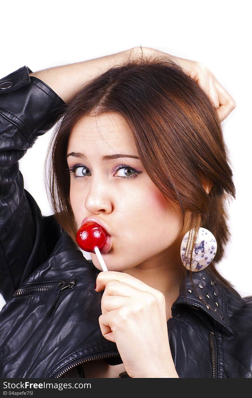 Portrait of sensual pretty woman holding lollipop caramel, close up, over white