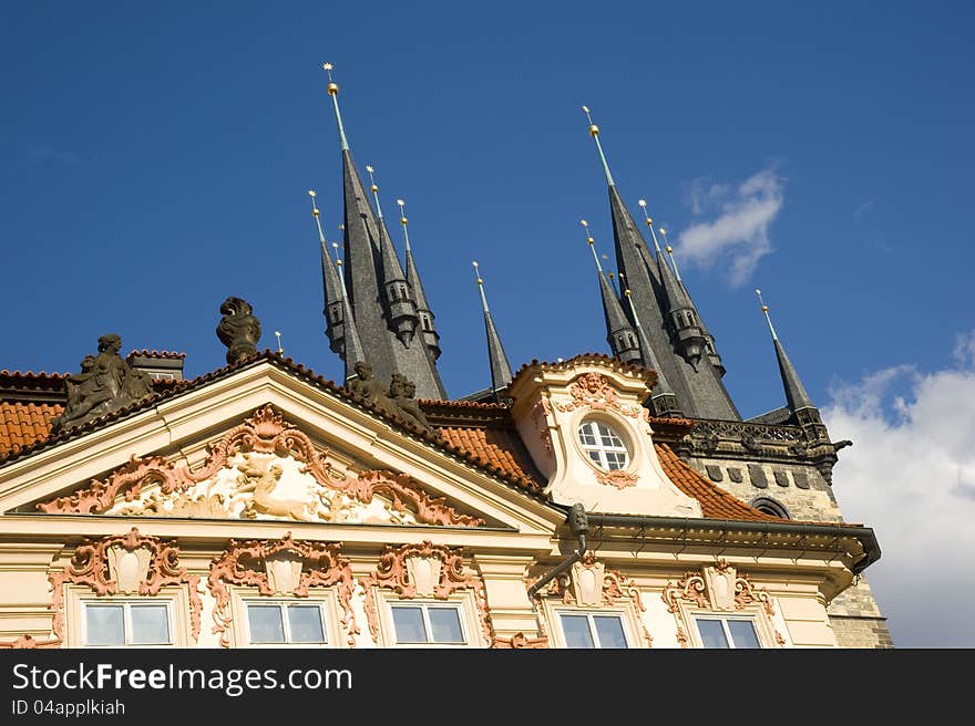 Prague. Czech Republic. April 2012. Detail of architectural facade Old Town square looking towards the Gothic spires of Tyn church, dating to 1350. Prague. Czech Republic. April 2012. Detail of architectural facade Old Town square looking towards the Gothic spires of Tyn church, dating to 1350.