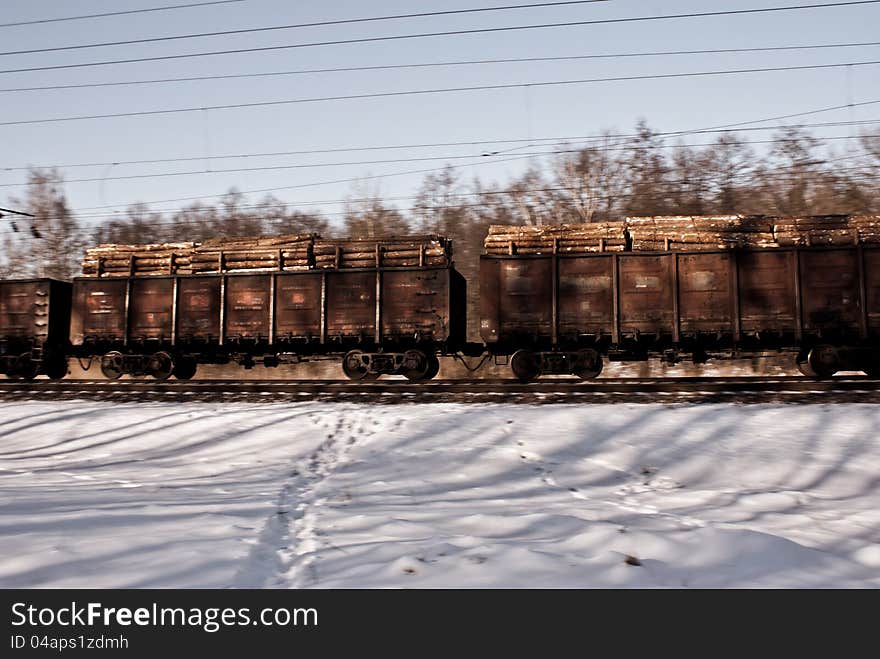 Freight railway cars on winter track