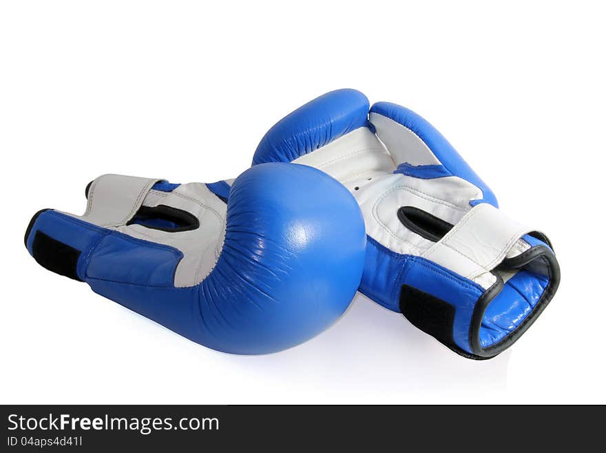 Blue and white boxing gloves are on a white background. Blue and white boxing gloves are on a white background