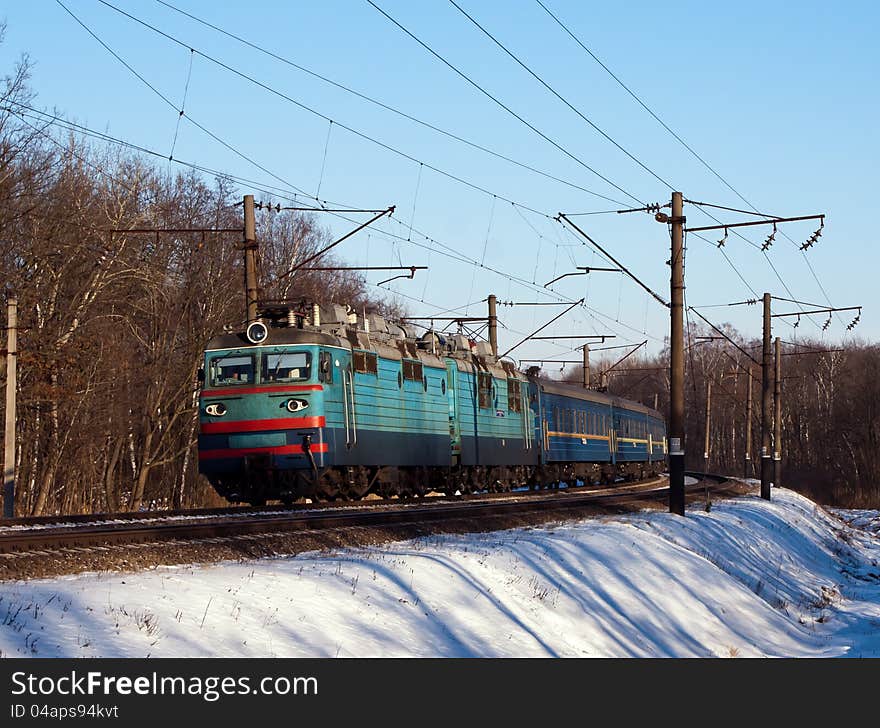 Electric locomotive with passenger cars