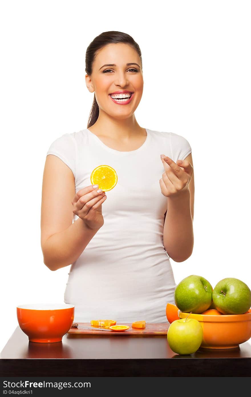 Young laughing woman with fruit isolated on white background