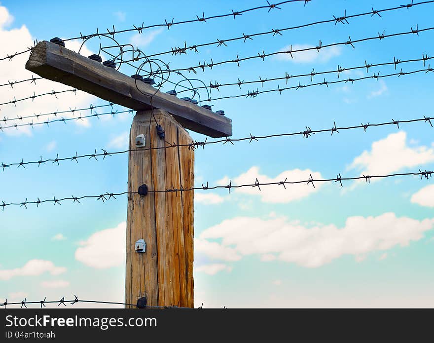 Post With Barbed Wire