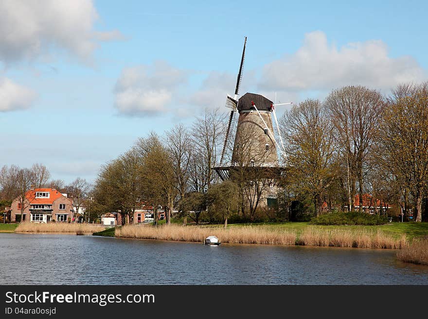 Old windmill in Dutch landscape