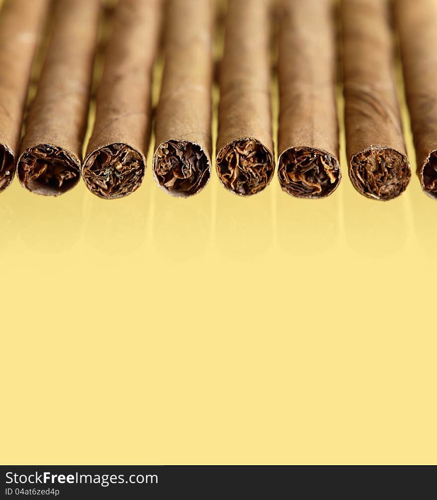 Cigars On Yellow