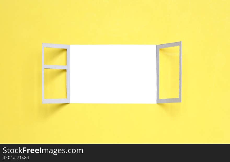 Yellow paper background with open window for your images. Clipping path is included