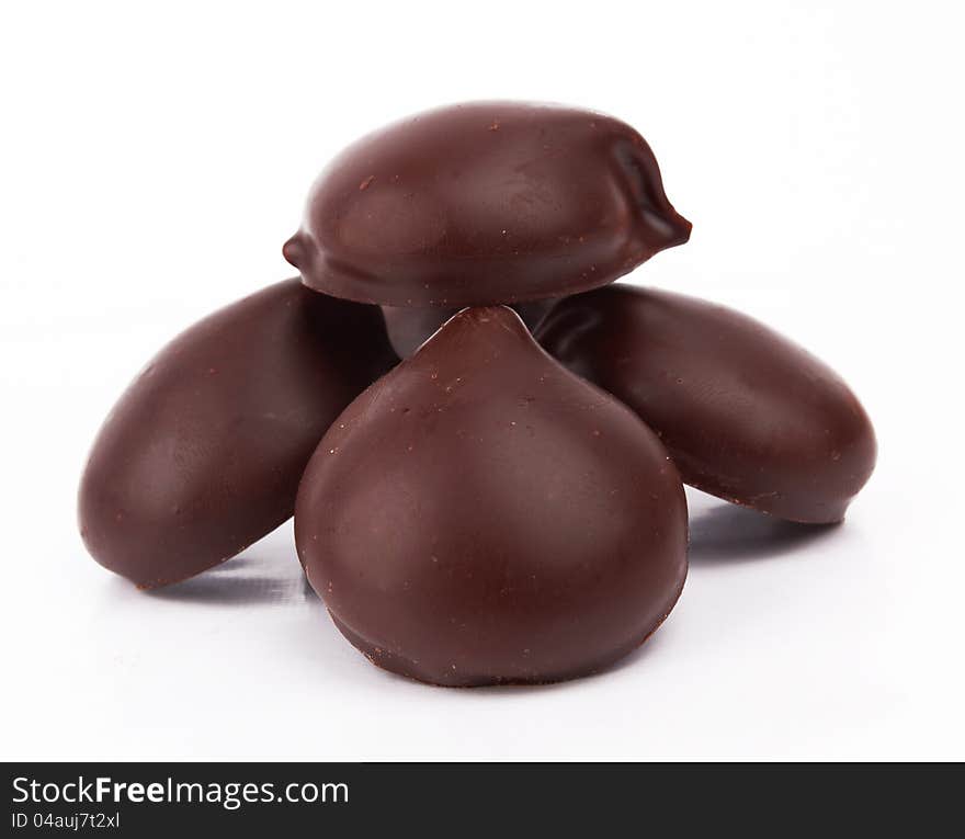 Chocolate candies on white background