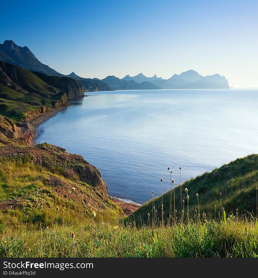 Beautiful view of the coastline with the green hills