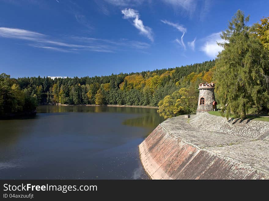 Pond with autumn trees and blue sky cloud. Pond with autumn trees and blue sky cloud