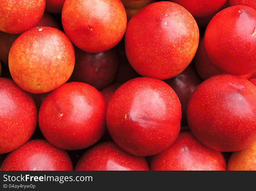 Heaps of round plums