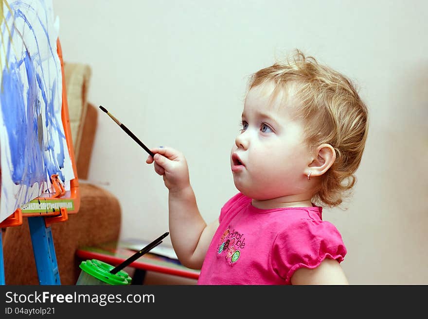 Adorable little girl drawing artwork. Adorable little girl drawing artwork