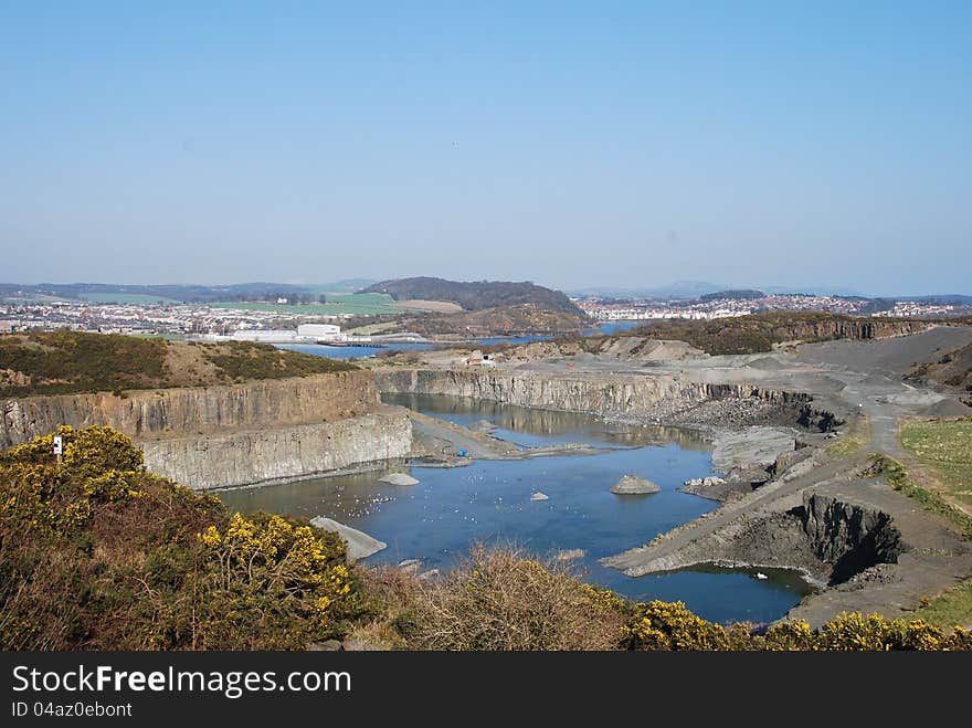 A view into a massive opencast quarry near the Fife town of Inverkeithing. A view into a massive opencast quarry near the Fife town of Inverkeithing