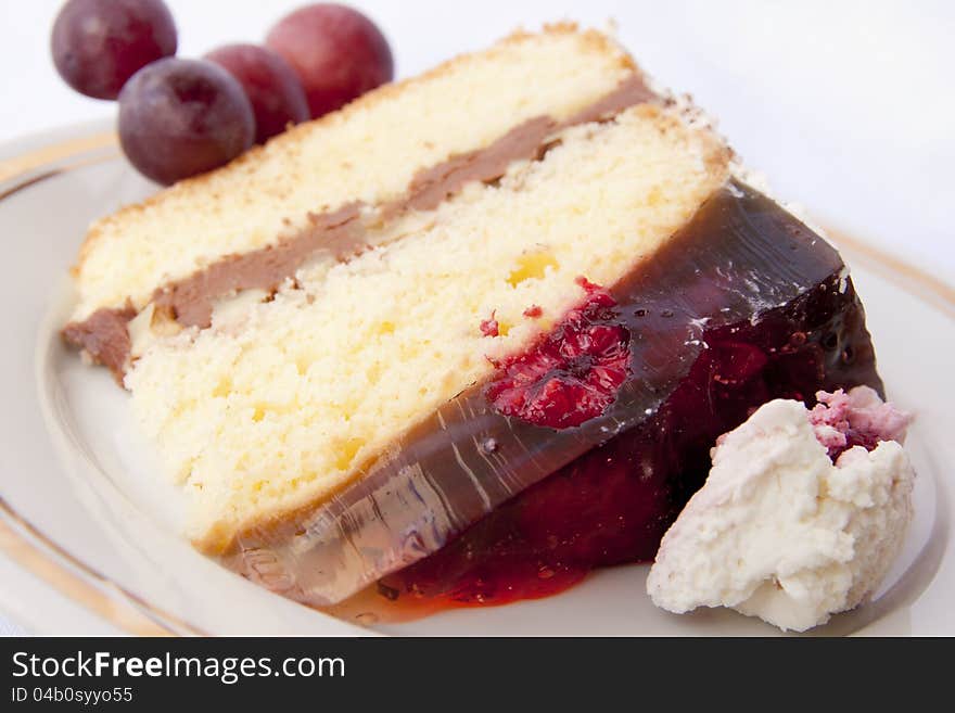 Cake with raspberry jelly. In the middle of the chocolate mass.