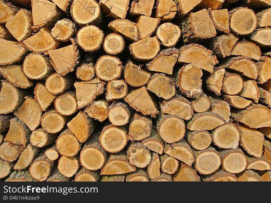 Pile of wood logs, structured background. Pile of wood logs, structured background