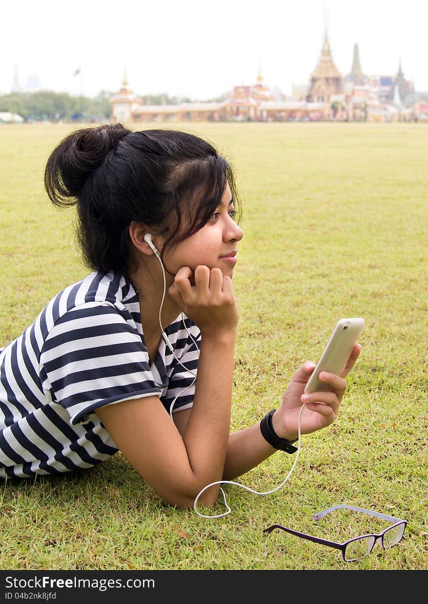 Listening to Music at park, outdoor