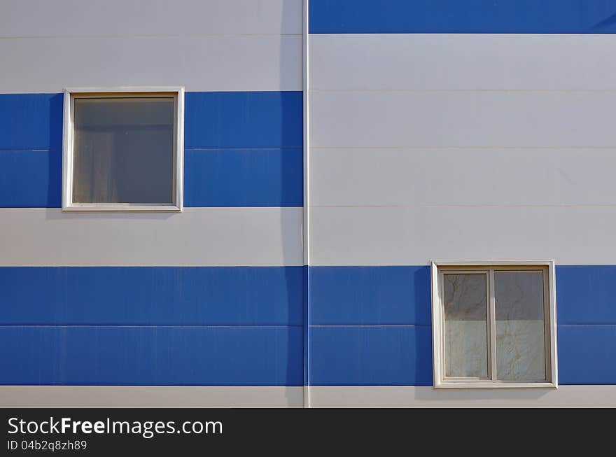 Windows facade and on metallic building. Windows facade and on metallic building