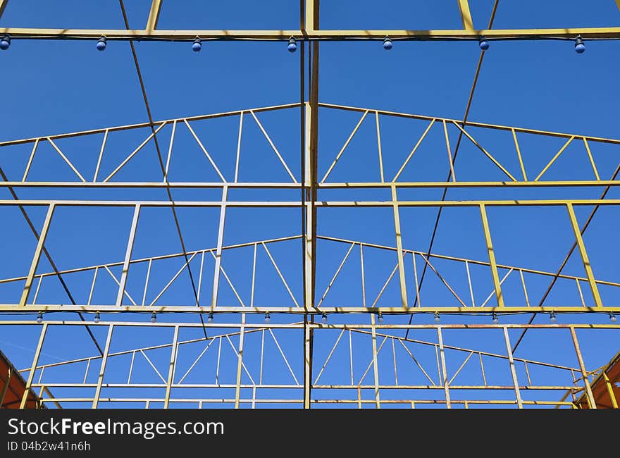 Construction metallic site of new block of flats or roof. Construction metallic site of new block of flats or roof