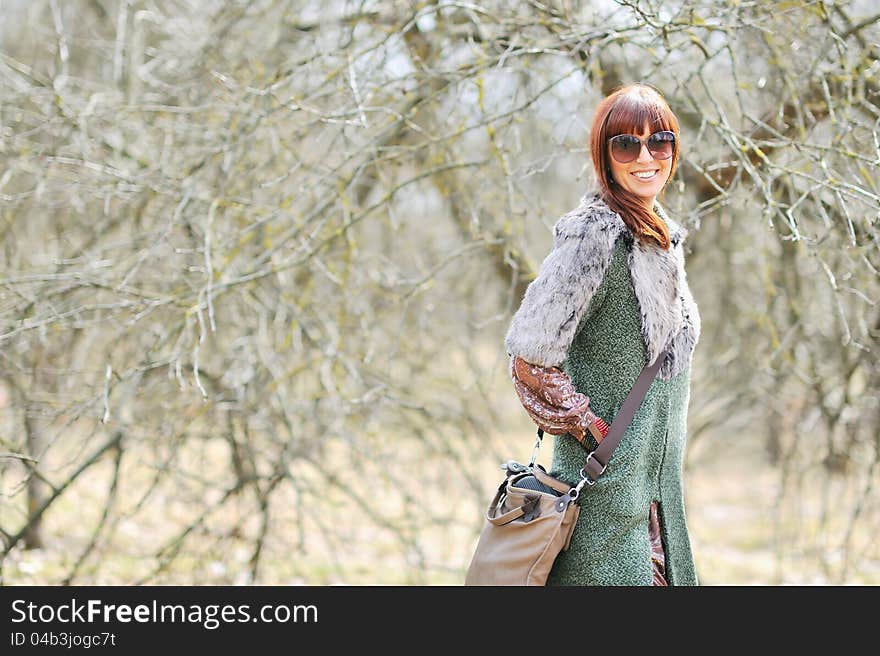 Portrait of beautiful girl in sunglasses outdoors