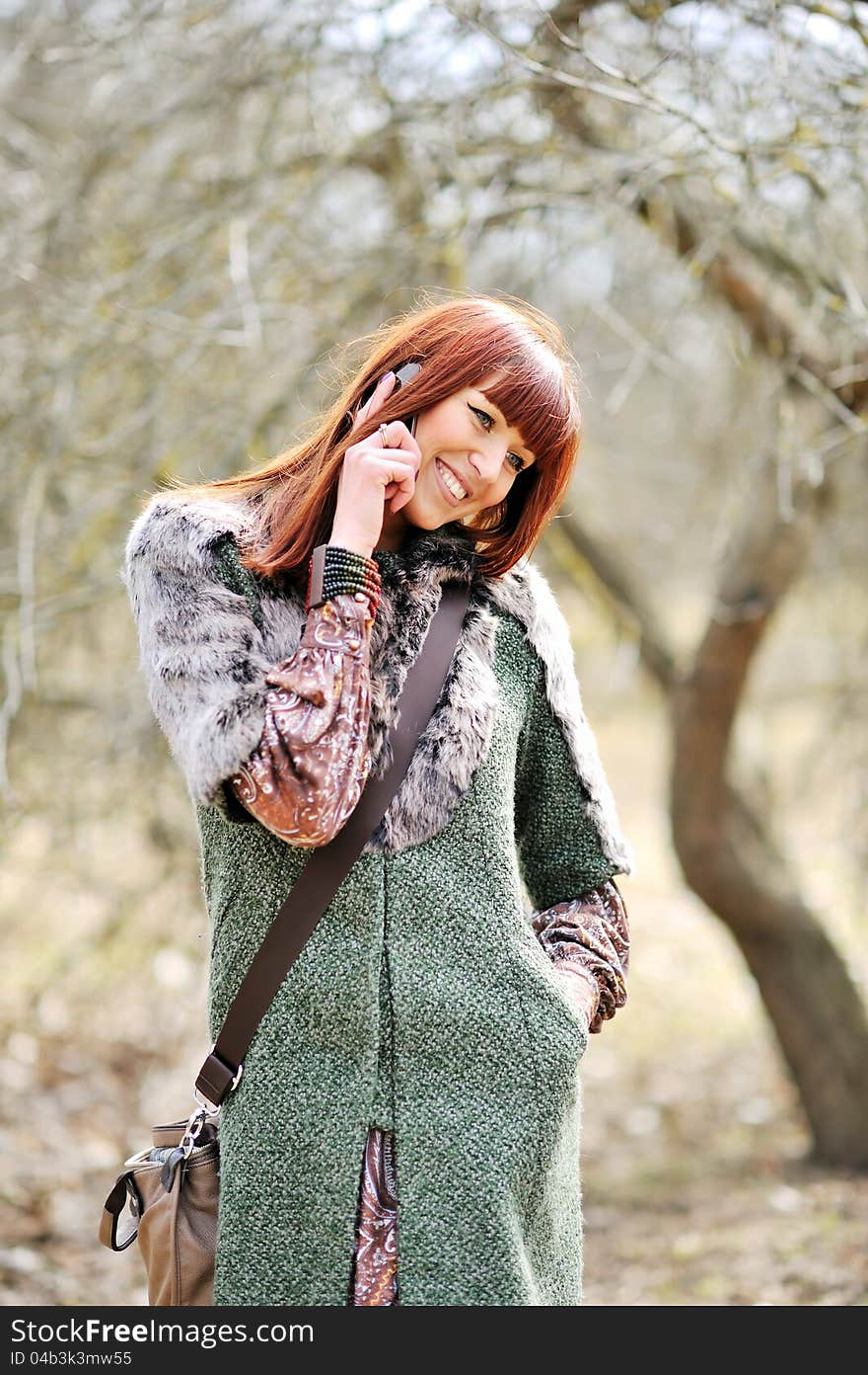 A shot of beautiful female talking on the phone