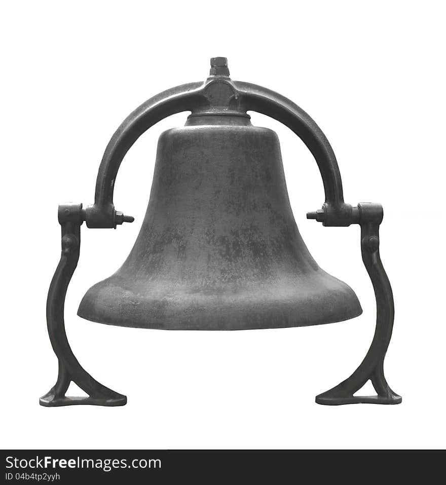 Old black cast iron bell isolated.