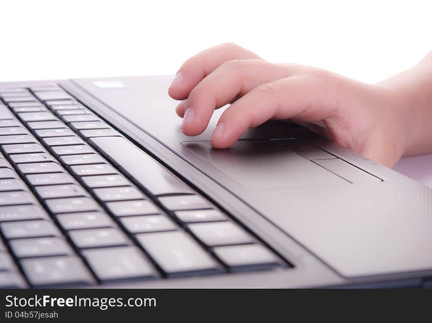 Child's hands on the keyboard of notebook. Child's hands on the keyboard of notebook