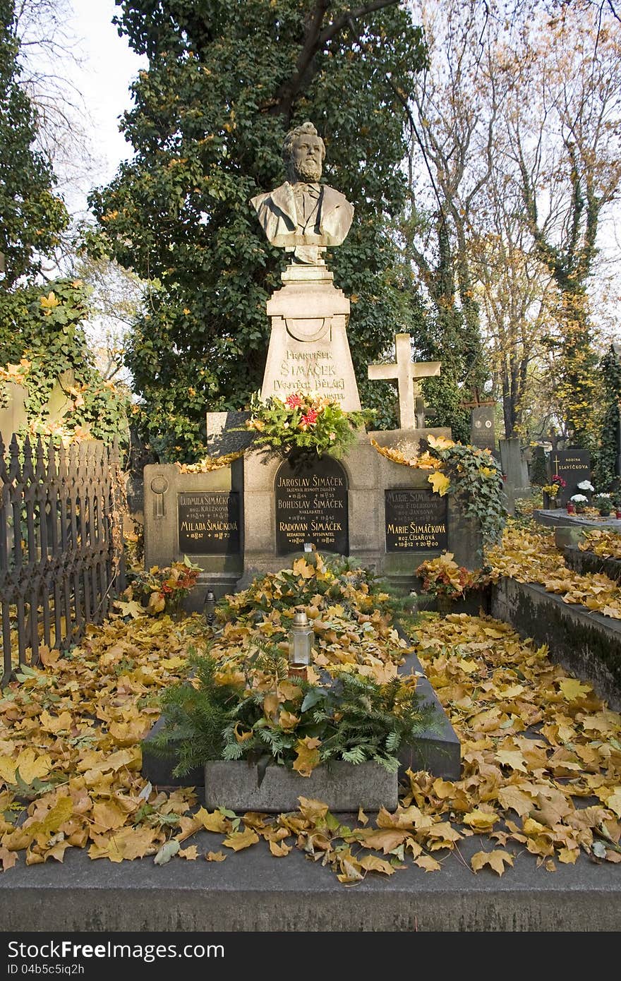 Grave covered with yellow leaves. Grave covered with yellow leaves