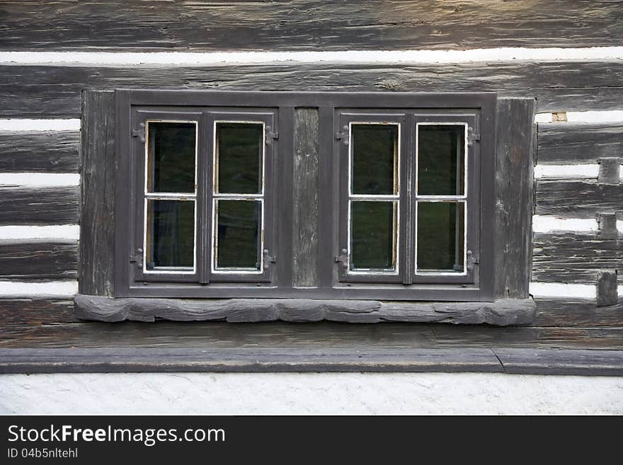 Detail of windows of old black and white cottage. Detail of windows of old black and white cottage