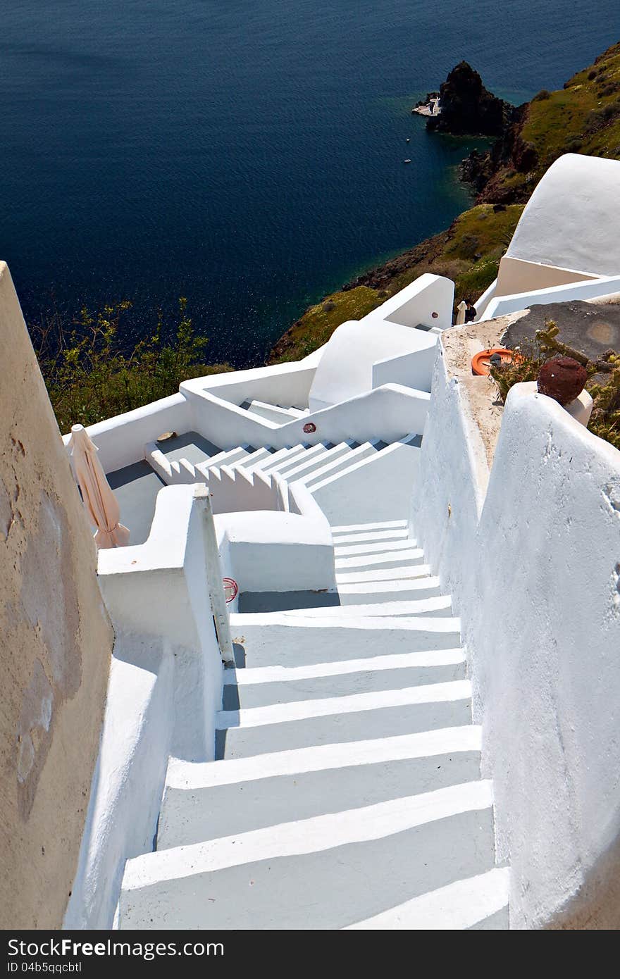 Traditional city of Fira at Santorini island in Greece. Detail image of some steps
going downwards the caldera cliff. Traditional city of Fira at Santorini island in Greece. Detail image of some steps
going downwards the caldera cliff